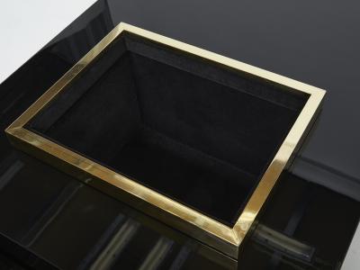 Jean Claude Mahey J C Mahey black lacquer and brass bar coffee table 1970s