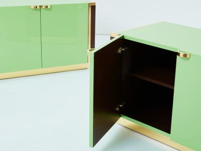 Jean Claude Mahey J C Mahey pair of small green lacquer and brass cabinets 1970s