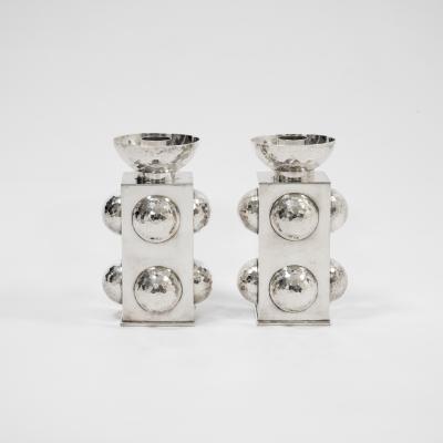 Jean Despres Pair of candle holders