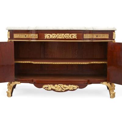 Jean Henri Riesener Very fine Louis XVI style ormolu mounted marquetry commode