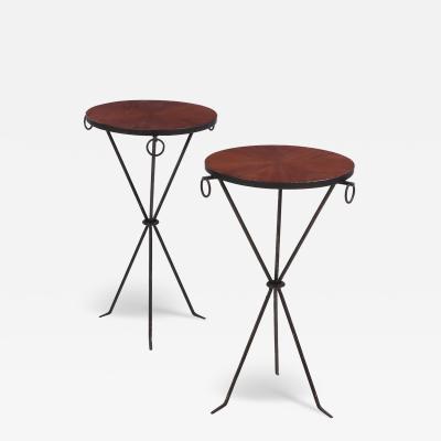 Jean Michel Frank A pair of iron and mahogany drinks tables in the manner of Jean Michel Frank 
