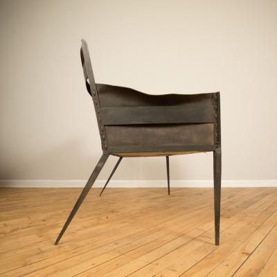 Jean Michel Frank An iron and leather Jean Michel Frank style settee