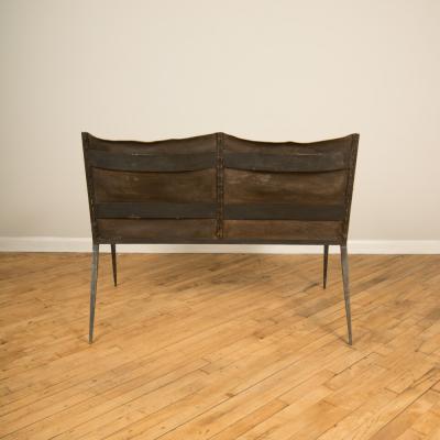 Jean Michel Frank An iron and leather Jean Michel Frank style settee