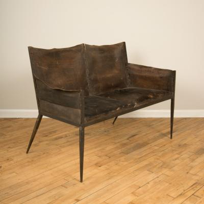 Jean Michel Frank An iron and leather Jean Michel Frank style settee