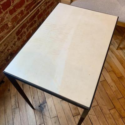 Jean Michel Frank An iron and parchment end table in the manner of Jean Michel Frank 