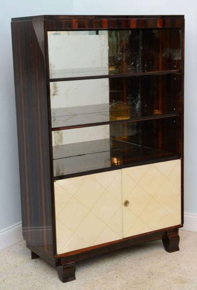 Jean Pascaud Jean Pascaud Art Deco French Ebony De Macassar and Parchment Bookcase