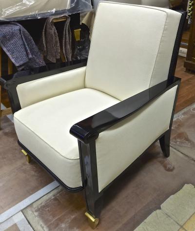 Jean Pascaud Jean Pascaud documented pair of black lacquered arm chairs with gold end leg