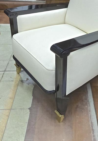Jean Pascaud Jean Pascaud documented pair of black lacquered arm chairs with gold end leg