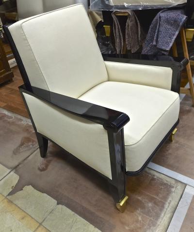 Jean Pascaud Jean Pascaud documented pair of black lacquered arm chairs with gold end leg