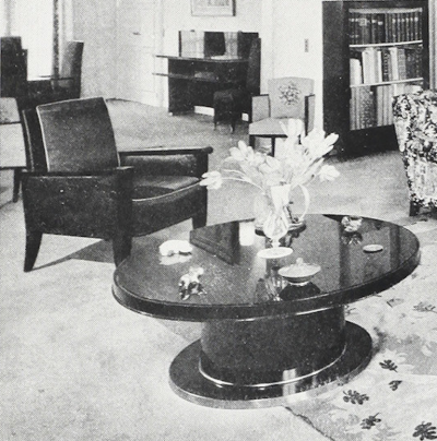 Jean Pascaud Jean Pascaud documented pair of black lacquered arm chairs with gold end leg