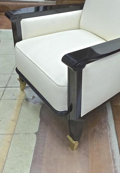Jean Pascaud Jean Pascaud documented pair of black lacquered arm chairs with gold end leg