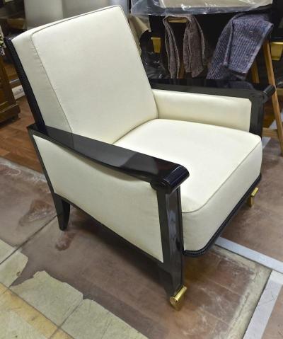 Jean Pascaud Jean Pascaud documented pair of black lacquered arm chairs with gold end leg