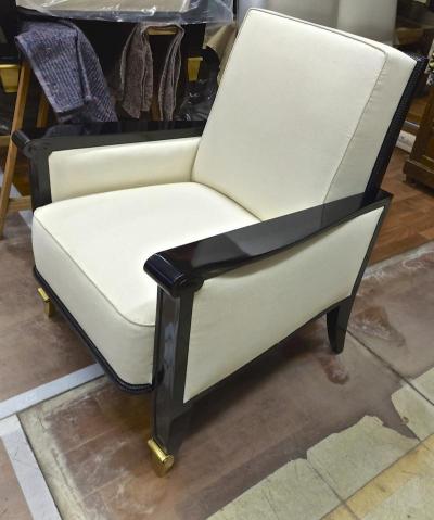 Jean Pascaud Jean Pascaud documented pair of black lacquered arm chairs with gold end leg