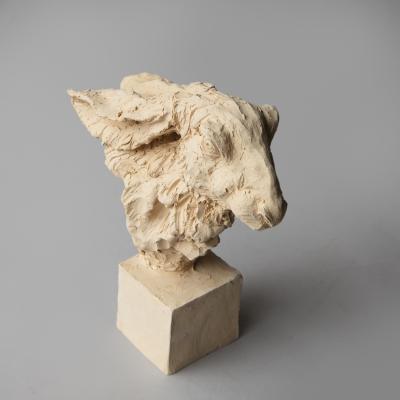 Jean Paul Gourdon SCULPTURE OF HARES HEAD WITH EARS FOLDED MOUNTED ON A SQUARE SOCLE 