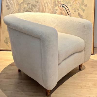 Jean Roy re Jean Royere comfy pair of lounge chairs newly covered in wool faux fur