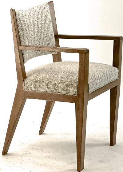 Jean Roy re Jean Royere refined oak arm chair newly covered In boucle cloth