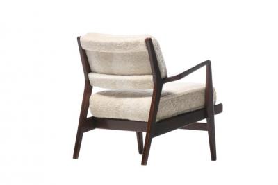 Jens Risom Jens Risom Walnut Lounge Chairs in Ivory Shearling circa 1950s