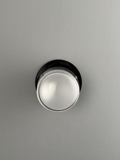 Joe Colombo Pair of Joe Colombo Black Fresnel Glass Metal Wall Lamps for Oluce