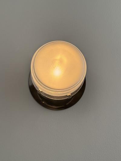 Joe Colombo Pair of Joe Colombo Black Fresnel Glass Metal Wall Lamps for Oluce