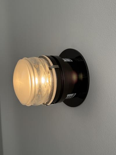 Joe Colombo Pair of Joe Colombo Black Fresnel Glass Metal Wall Lamps for Oluce