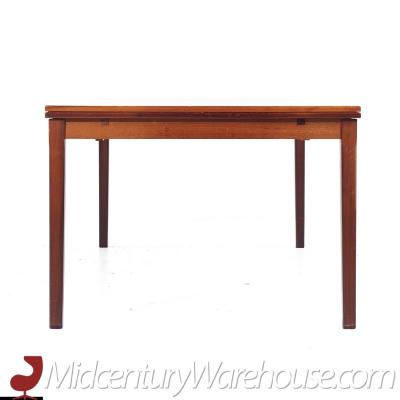 Johannes Andersen Johannes Andersen Style Mid Century Danish Rosewood Hidden Leaf Dining Table