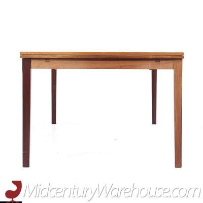 Johannes Andersen Johannes Andersen Style Mid Century Danish Rosewood Hidden Leaf Dining Table