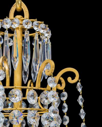 John Blades A FINE PAIR OF REGENCY PERIOD CHANDELIERS BY JOHN BLADES