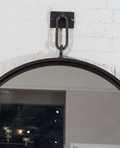 John McDevitt A 32 Patinated Steel Circular Pendant Mirror