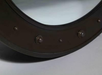 John McDevitt A 45 Circular Steel Mirror with Bosses in Statuary Bronze Finish