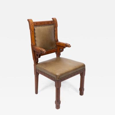John Pollard Seddon John Pollard Seddon A Rare Gothic Oak Armchair with Carved Dog Heads to the Arms