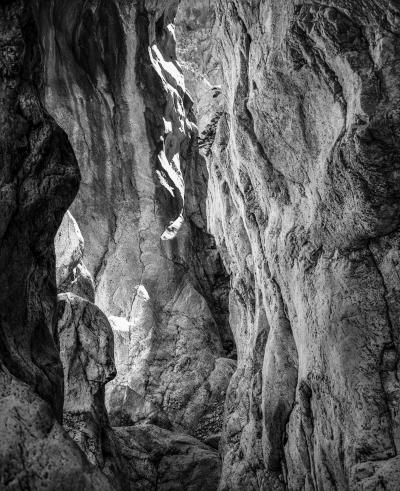 John Stathatos Homage to Heraclitus Earth II Black and White Landscape Photograph of a Cave