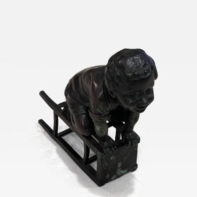 Juan Clara BOY PLAYING ON CHAIR BRONZE BY JUAN CLARA