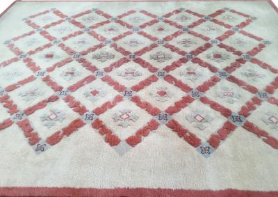 Jules Leleu A woollen rug with geometrical decoration