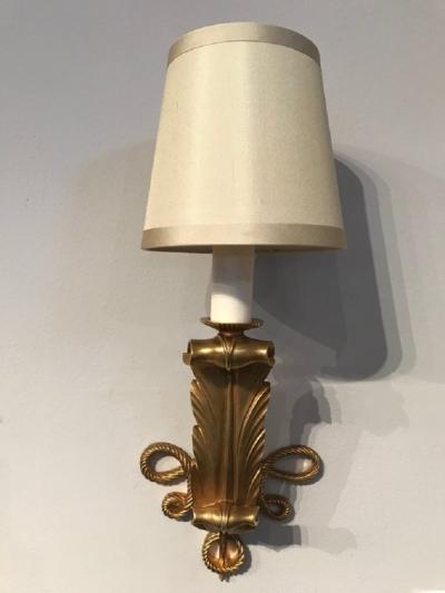 Jules Leleu Rare and elegant pair of art deco gilt bronze sconces by Jules Leleu