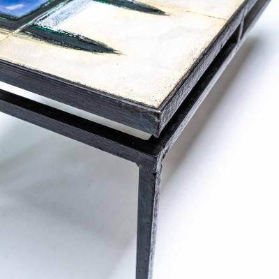 Juliette Belarti Juliette Belarti abstract ceramic top on wrought iron coffee table