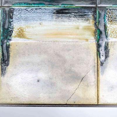 Juliette Belarti Juliette Belarti abstract ceramic top on wrought iron coffee table