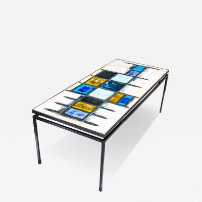 Juliette Belarti Juliette Belarti abstract ceramic top on wrought iron coffee table