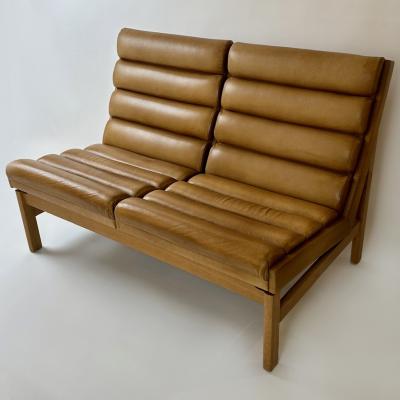 Karl Erik Ekselius Mid Century Modern Pair of Swedish Oak Cognac Leather Sofas by K E Ekselius