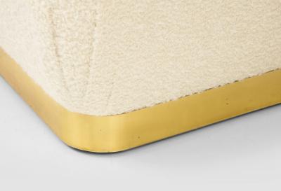 Karl Springer Pair of Souffle Ottomans in Ivory Boucl and Brass by Karl Springer