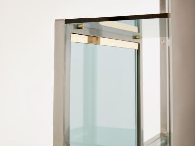 Kim Moltzer Pair of Kim Moltzer brushed steel brass green lucite shelving units 1970s