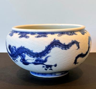 Kozan Makuzu Japanese Glazed and Caved Ceramic Dragon Bowl by Makuzu Kozan