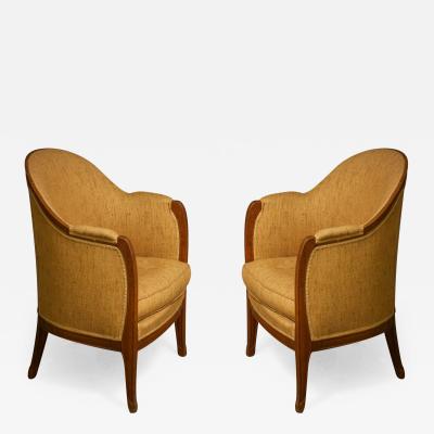 L on Jallot Leon Jallot Pair of Sculpted Pearwood Armchairs