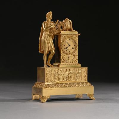 LARGE FRENCH EMPIRE PERIOD GILT BRONZE FIGURAL MANTEL CLOCK