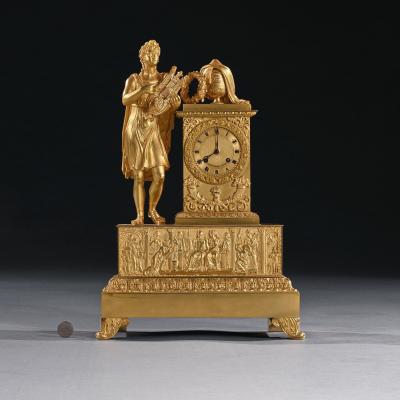 LARGE FRENCH EMPIRE PERIOD GILT BRONZE FIGURAL MANTEL CLOCK