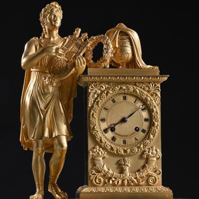 LARGE FRENCH EMPIRE PERIOD GILT BRONZE FIGURAL MANTEL CLOCK