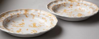 LARGE PAIR OF YELLOW AND WHITE SERVING PLATES WITH SHAPED RIMS