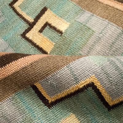 LARGE SWEDISH ART DECO FLAT WEAVE RUG WITH BLACKSMITH