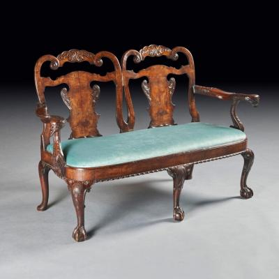 LATE 19TH CENTURY WALNUT TWIN CHAIR BACK SOFA AFTER A GEORGE II DESIGN 