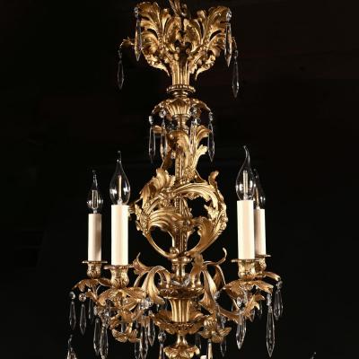LOUIS XV STYLE GILT BRONZE AND CUT GLASS TWENTY FIVE LIGHT CHANDELIER