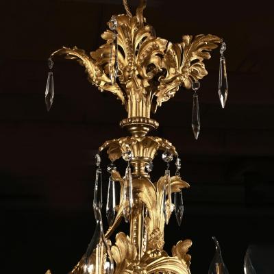LOUIS XV STYLE GILT BRONZE AND CUT GLASS TWENTY FIVE LIGHT CHANDELIER